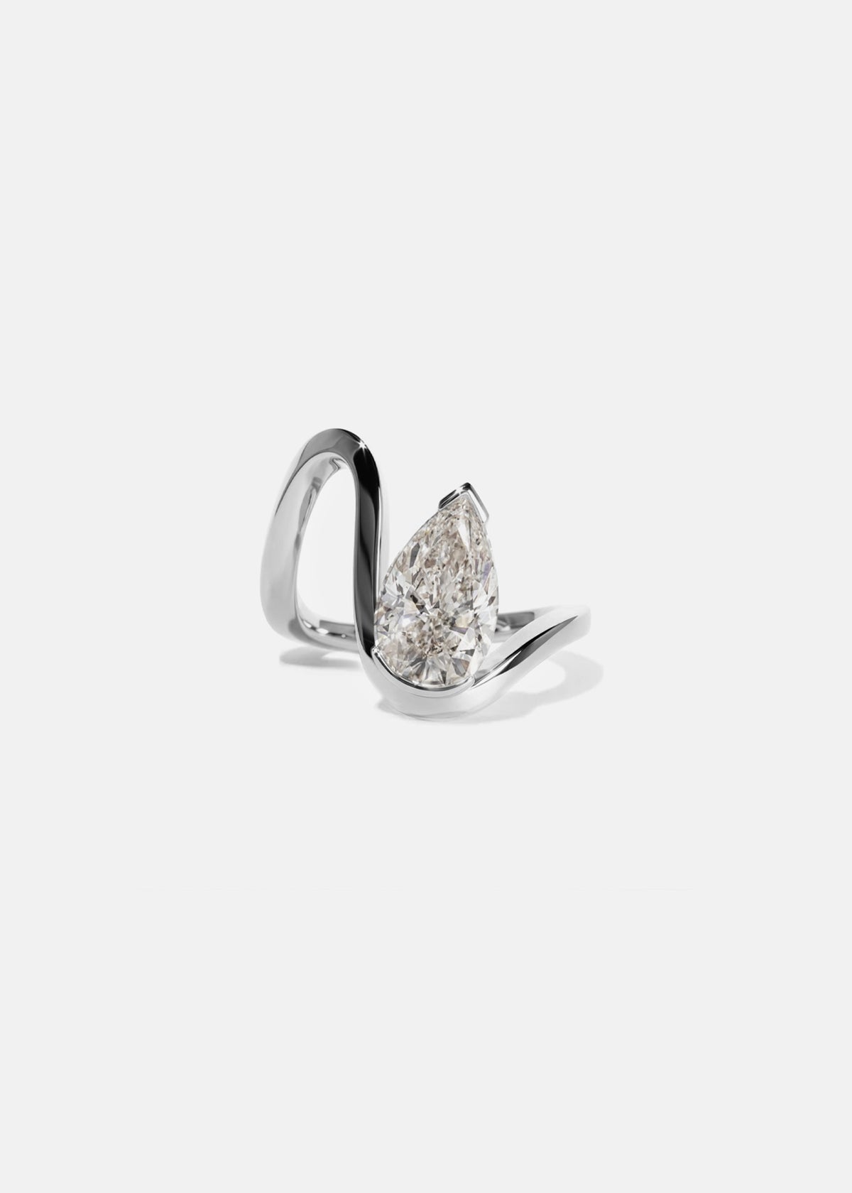 18k white gold trace band with a floating pear cut diamond slightly tilted