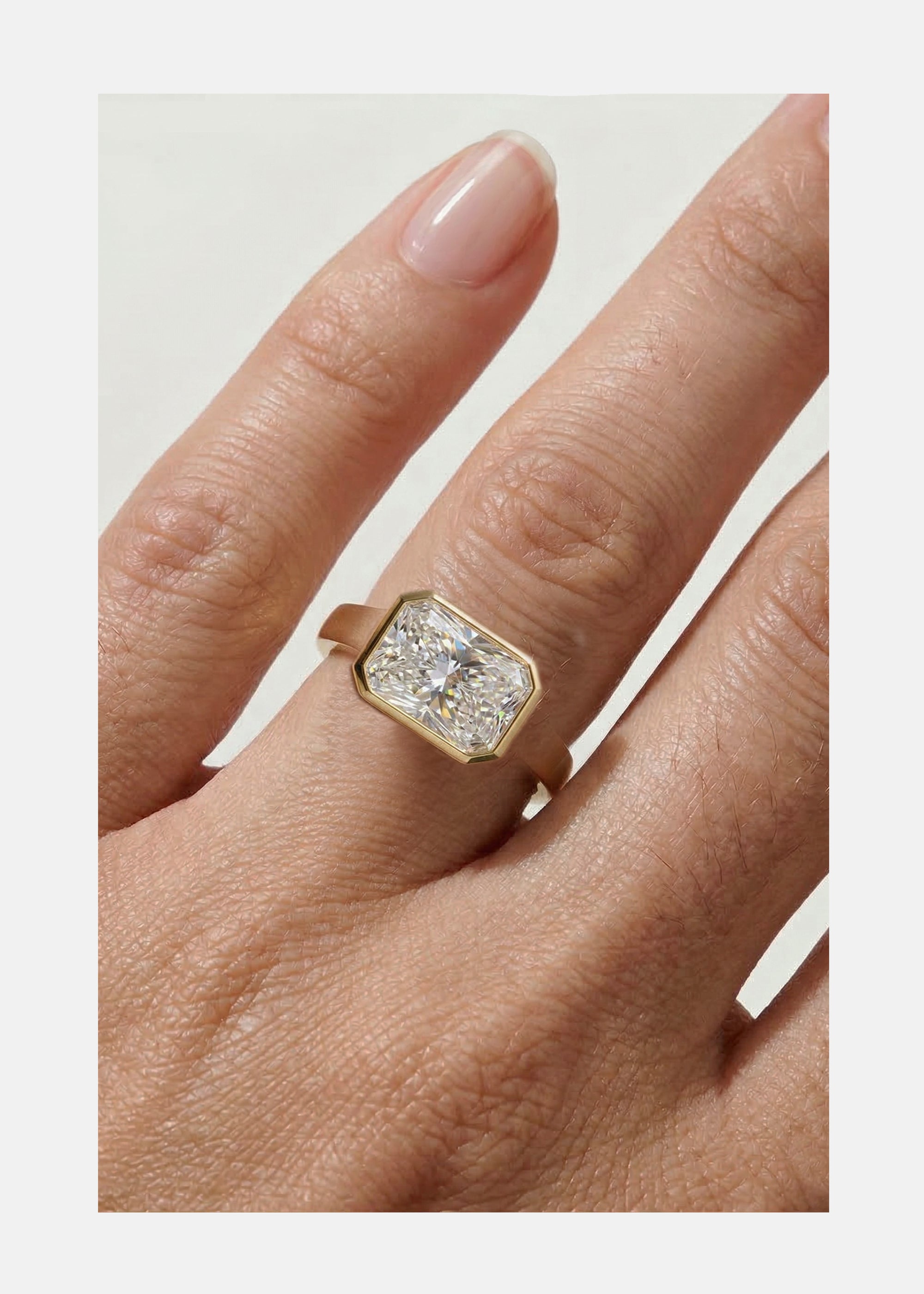 Radiant E/W Diamond Cosma Ring