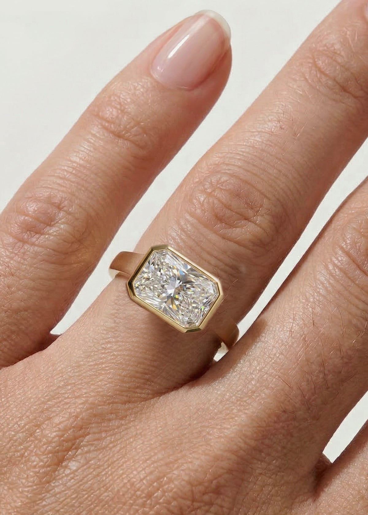 Radiant E/W Diamond Cosma Ring