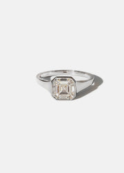 18k white gold tapering gold band - with a bezel set asscher cut diamond 