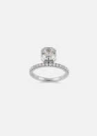 18k white gold engagement ring with a suspended floating asscher cut diamond and half pavé band