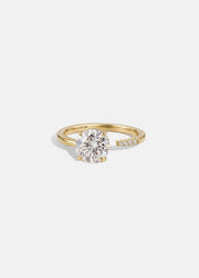 18k yellow gold Brilliant Crescendo Ring with a floating round brilliant diamond on a tapered open band