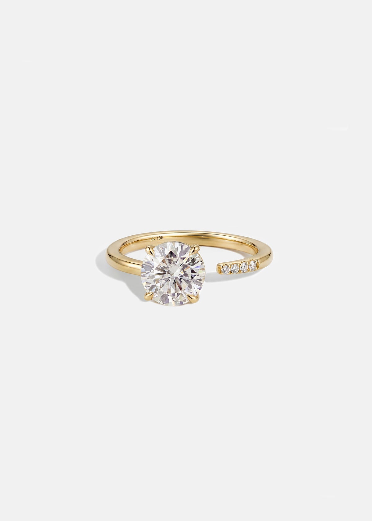 18k yellow gold Brilliant Crescendo Ring with a floating round brilliant diamond on a tapered open band