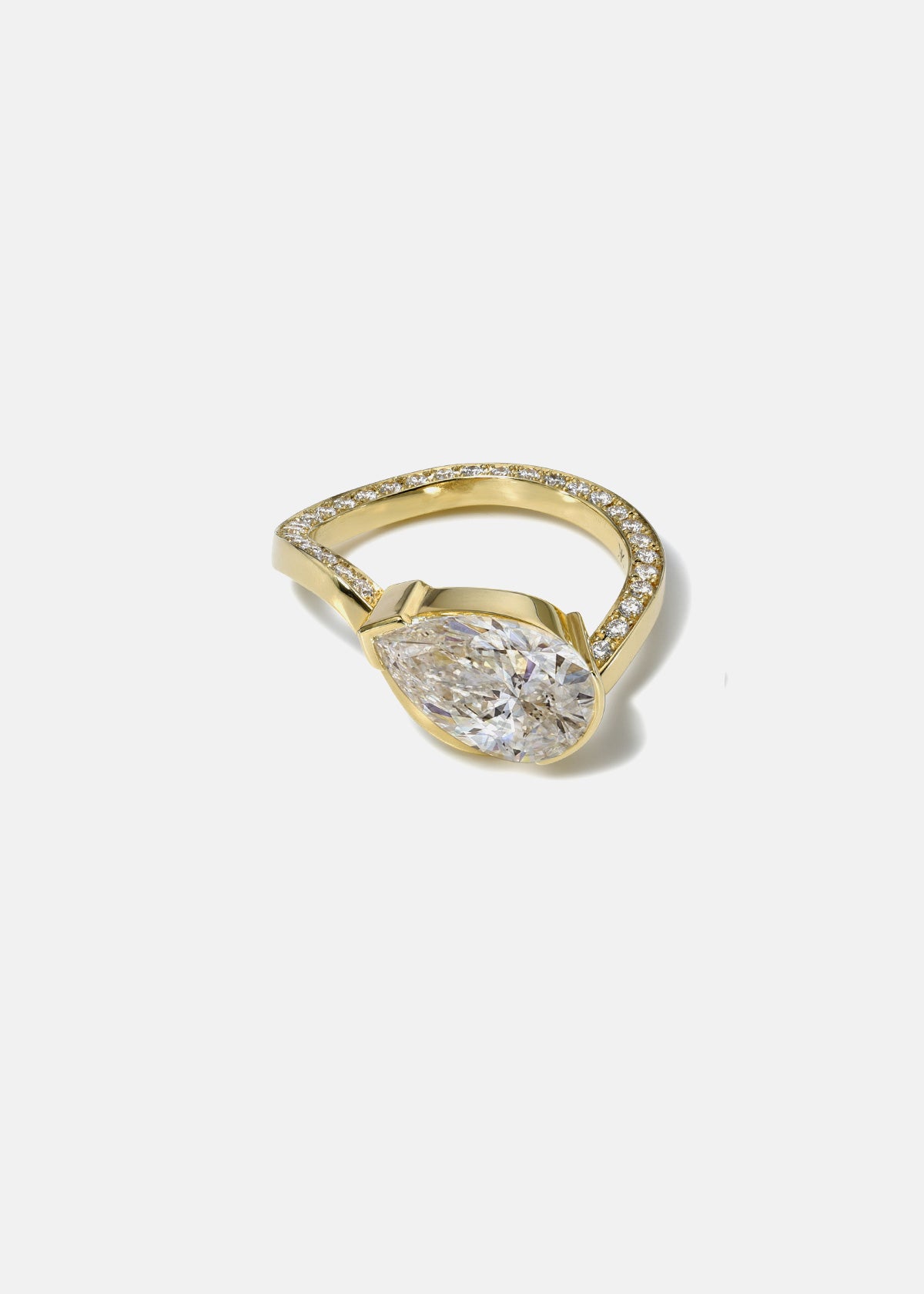 A 18k yellow gold ring- wave band with pavé diamonds- pear cut diamond