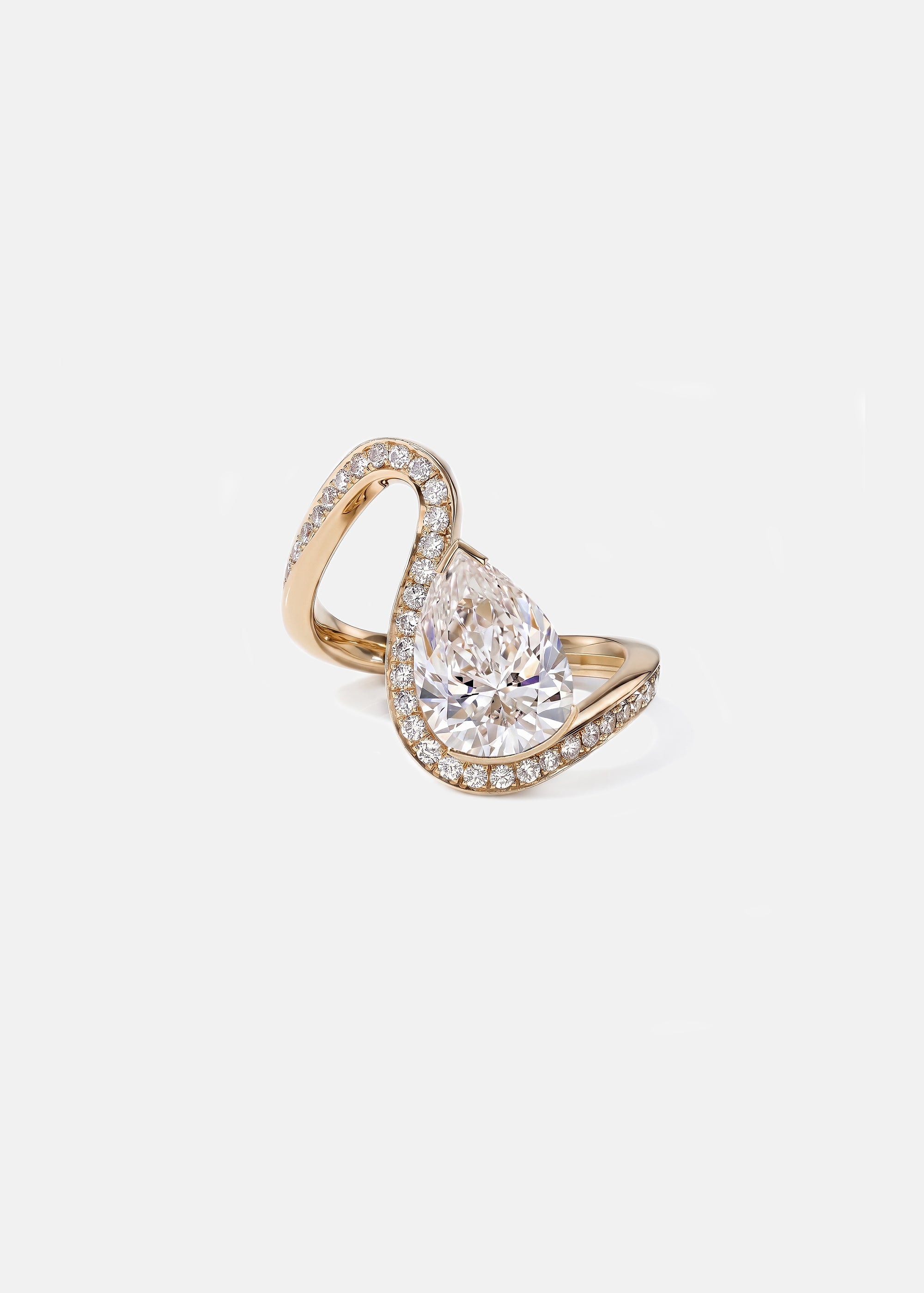 front view of a rose gold wave pavé band with a pear cut diamond -18K rose gold