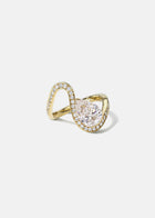 side view of a gold wave pavé band with a pear cut diamond -18K yellow gold