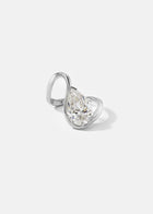 front view- 18k white gold trace band with a floating pear cut diamond