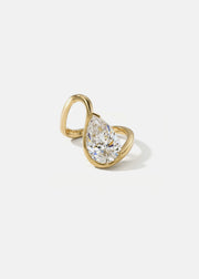 18k yellow gold trace band with a floating pear cut diamond