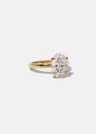 front view of a 18k yellow gold solitaire engagement ring featuring a oval cut diamond 