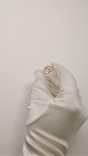 video showcasing the Asscher Diamond Cosma RIng in 18k yellow gold 