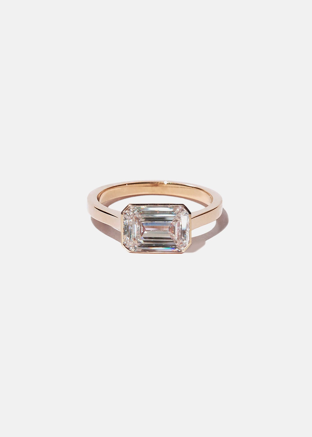 Emerald E/W Diamond Cosma Ring